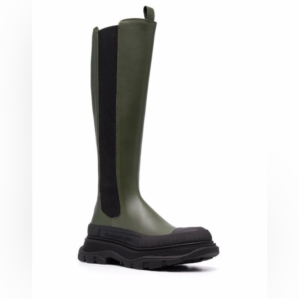 Alexander McQueen
Tread Slick leather mid-calf boots.
